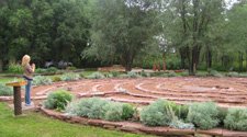 Rev Dr. Nancy Ash prepares to enter labyrinth for practice, Taos, NM